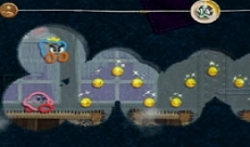 Review Kirby’s Epic Yarn: Kirby strijd in de multi-player samen met de Prince Fluff.