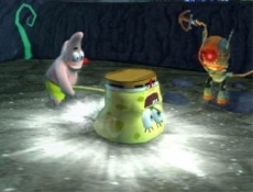 Review SpongeBob SquarePants: Truth or Square: Hier zie je Patrick met Spongebob (als hamer) slaan.